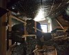 Abigail DeVille, XXXXXXX, 2013, reclaimed lumber, accumulated debris, plastic tarps, tar paper, dirt, sand from Lake Michigan, skeleton, dimensions variable.