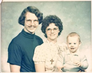 Family snapshot of Arrington de Dionyso (age 1) with his parents, 1976.